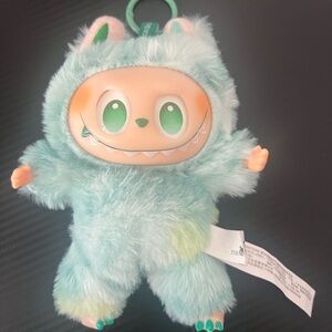 Plush Monster Toy with Green Accents